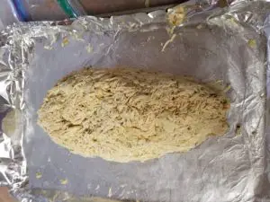 image shows shredding process for easy meal prep chicken