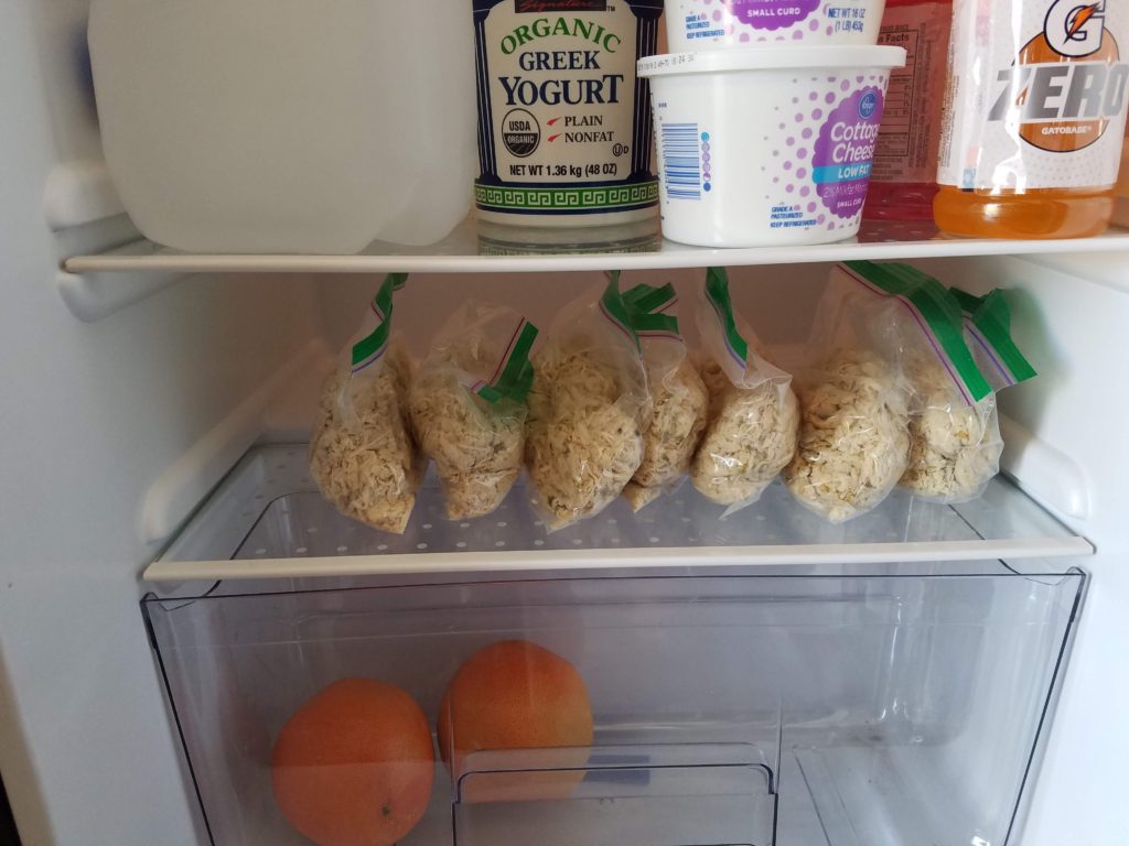 image shows how to store meal prep chicken in the refrigerator